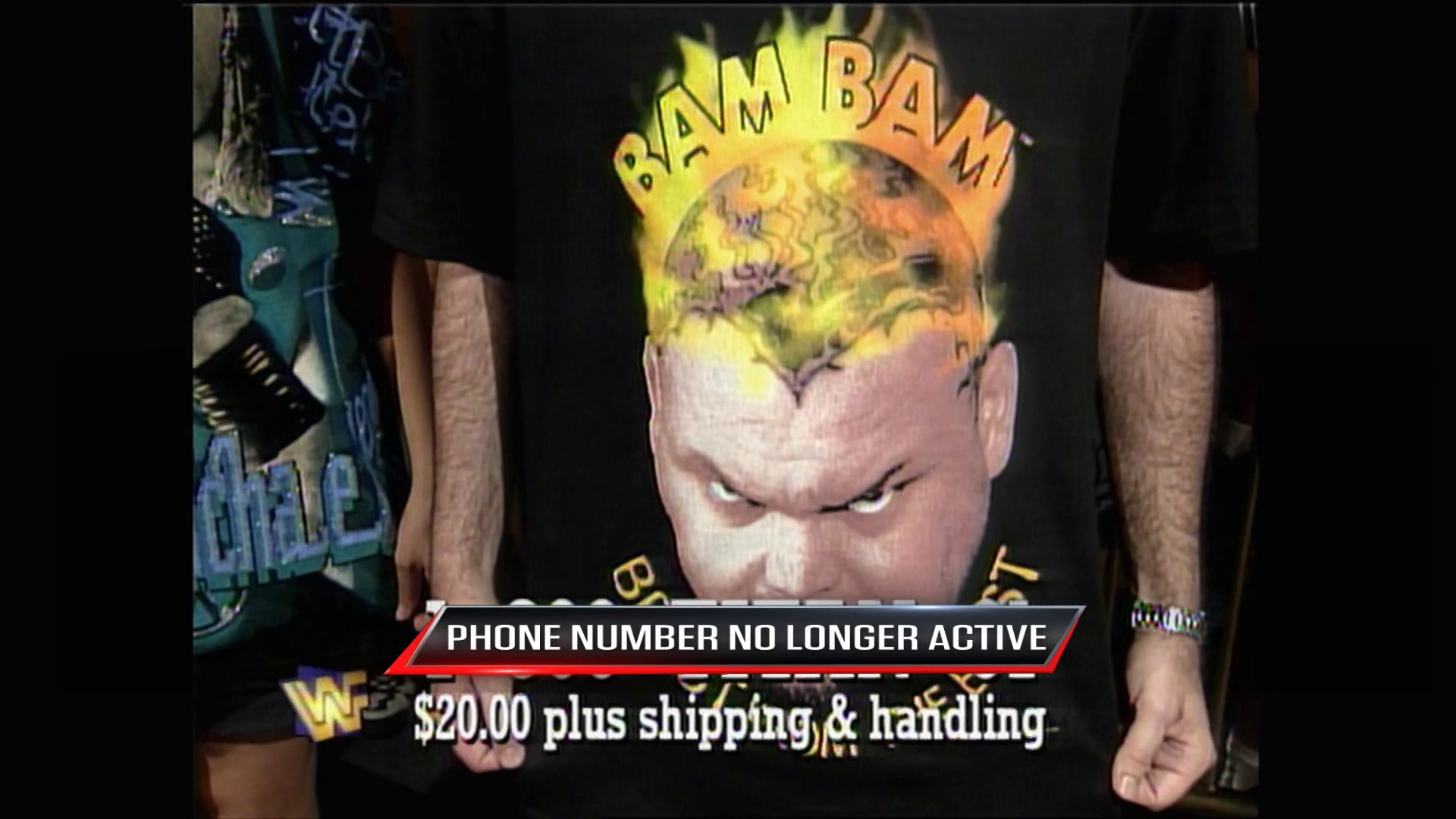 A frame from WWE Raw (July 3, 1995) at 26:33. A WWE merchandise advertisement features a t-shirt with "BAAM BAM" branding and a wrestler's face graphic. The overlay displays "PHONE NUMBER NO LONGER ACTIVE" and "$20.00 plus shipping & handling," with WWF logos visible in the frame.