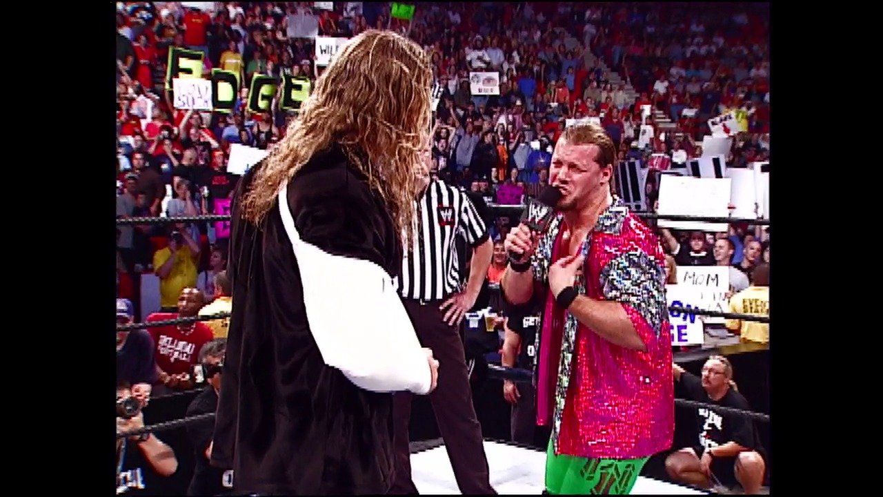 A frame from WWE Raw (July 4, 2002) at 1:02.