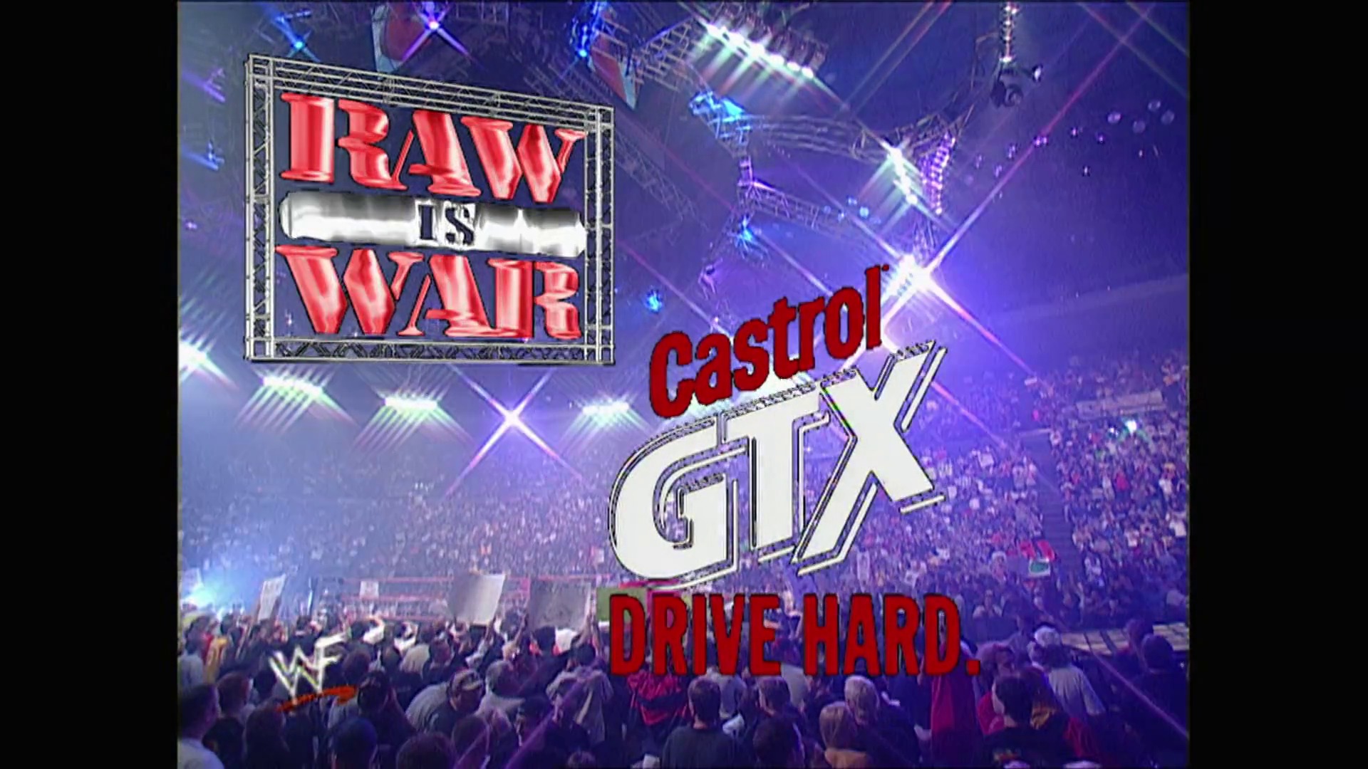 A frame from WWE Raw (May 14, 2001) at 26:15. A WWE Raw broadcast graphic displays the "Raw is War" logo alongside Castrol GTX sponsorship and "Drive Hard" tagline, set against a purple-lit arena filled with spectators and illuminated by stage lighting.