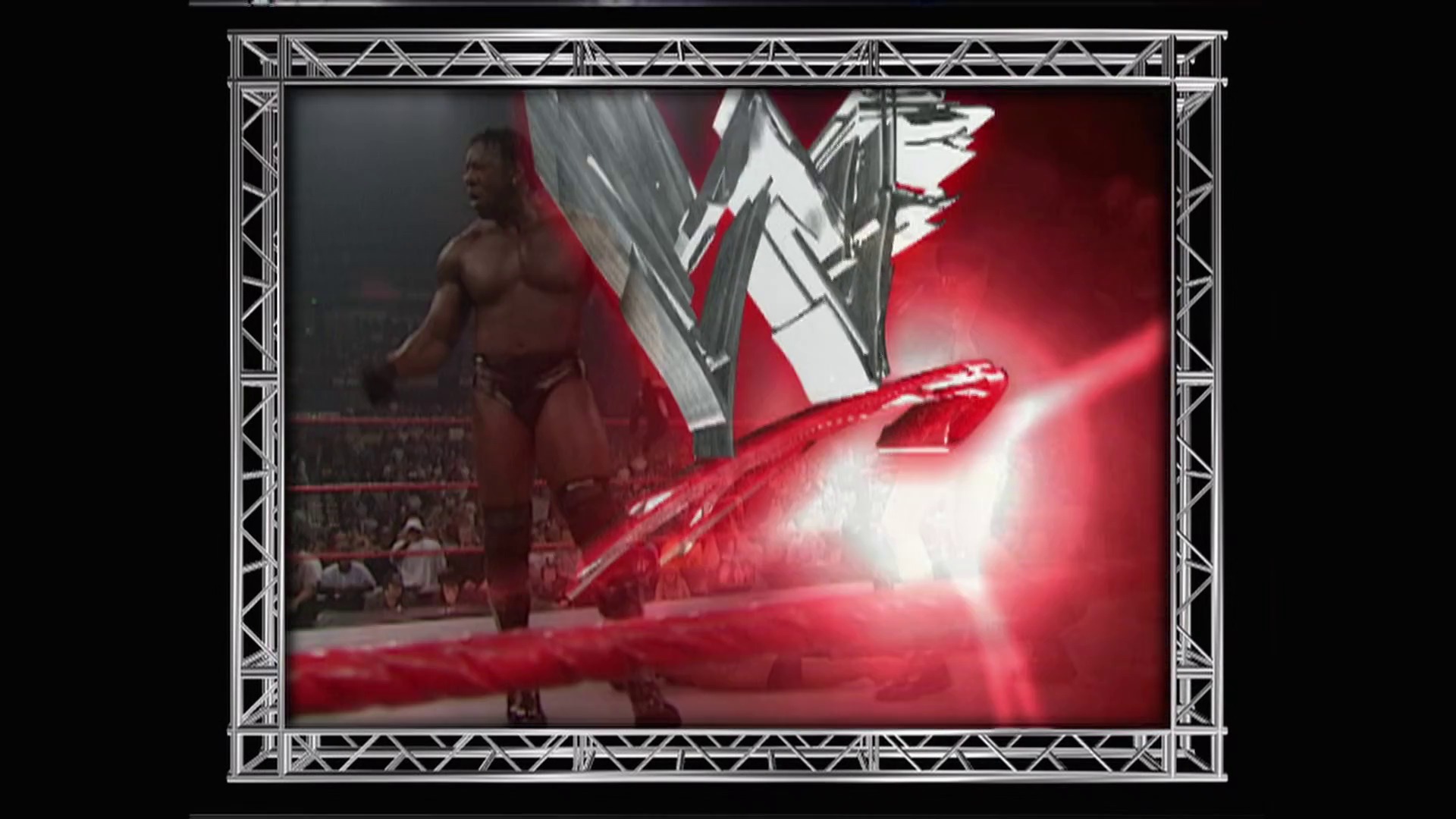 A frame from WWE Raw (September 17, 2001) at 1:21:58. A muscular wrestler stands in a WWE ring bathed in dramatic red lighting and special effects, with the Raw logo visible on the right side of the screen. The arena crowd is visible in the background as the wrestler poses amid the pyrotechnic display and metallic set design.