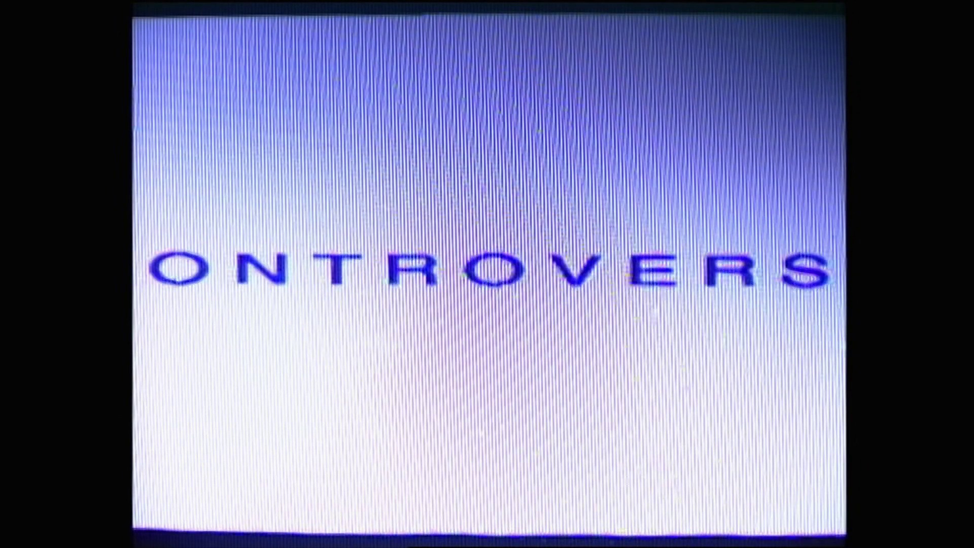 A frame from WWE Raw (June 10, 1996) at 28:26. A blue-tinted title card displaying the word "ONTROVERS" in bold capital letters against a vertically-lined background, typical of 1990s WWE broadcast graphics and presentation.