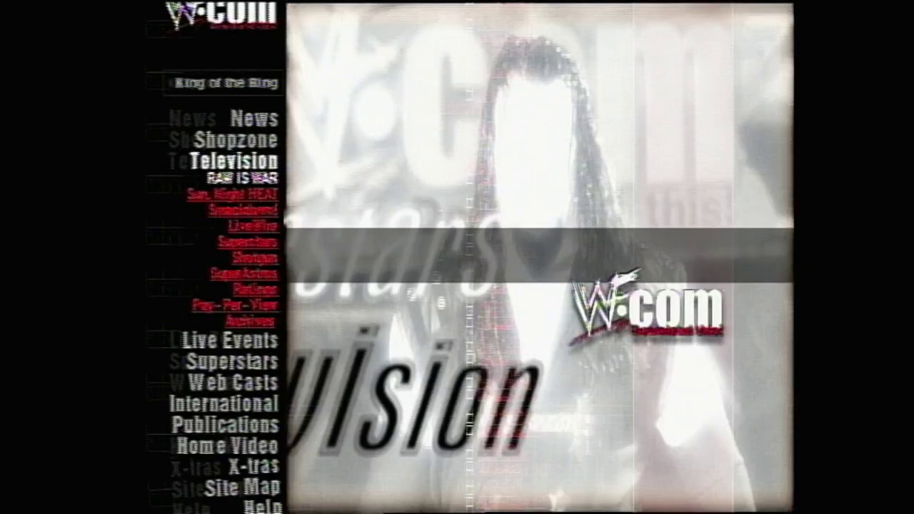 A frame from WWE SmackDown (April 7, 2000) at 1:07:36. A wrestler with long dark hair is captured mid-action in the ring, with the WWE.com logo and navigation menu visible on the left side of the screen, along with "Vision" text overlay in the center.