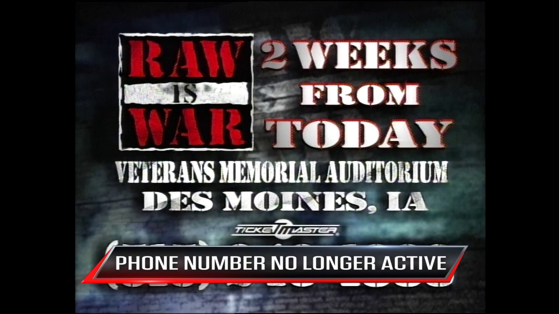 A frame from WWE Raw (June 16, 1997) at 40:04. A WWE Raw promotional graphic announces an event at Veterans Memorial Auditorium in Des Moines, Iowa, featuring bold red and white text stating "RAW IS WAR" and "2 WEEKS FROM TODAY," with a Ticketmaster logo and a notification that the phone number is no longer active.