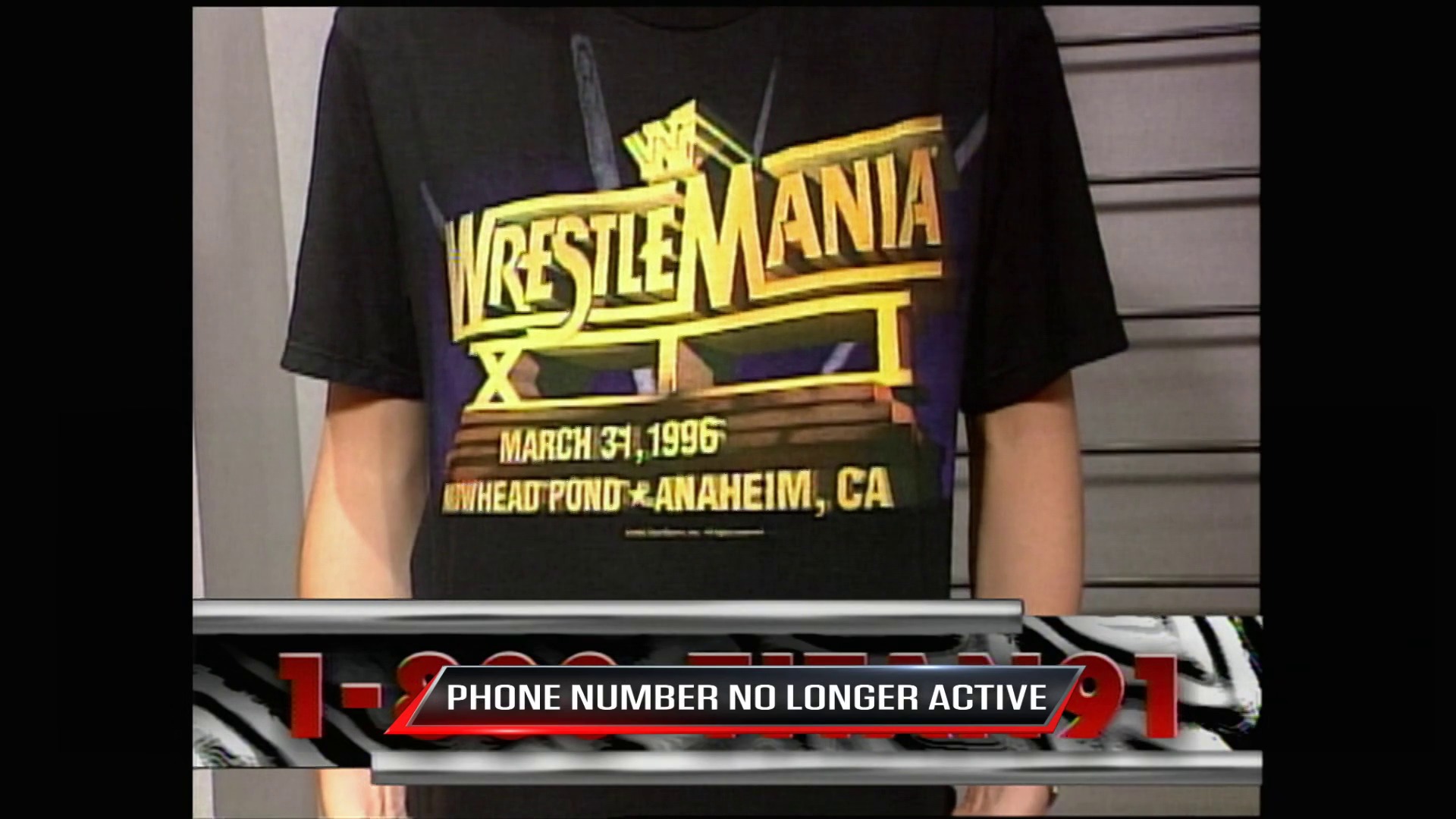 A frame from WWE Raw (February 26, 1996) at 22:14.