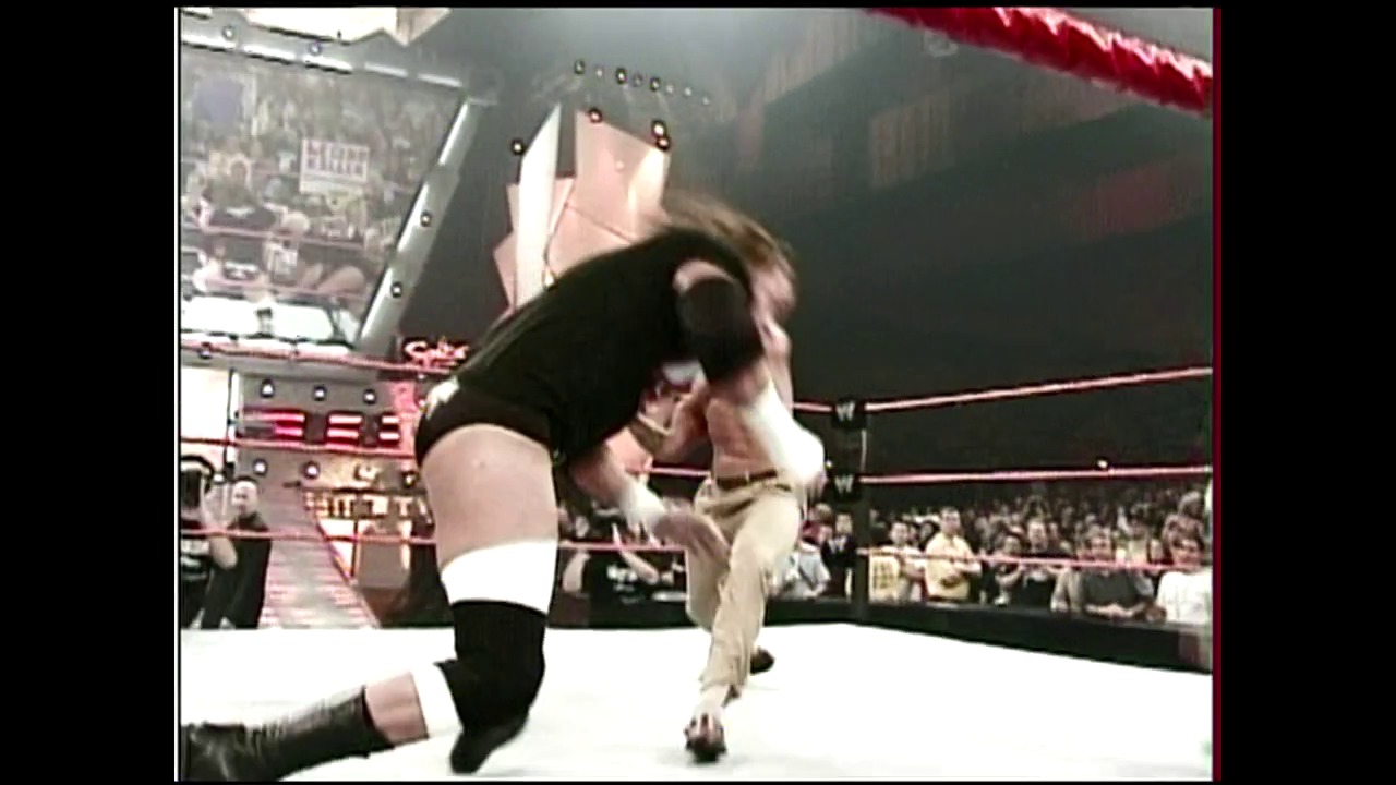 A frame from WWE Raw (September 6, 2004) at 0:48.